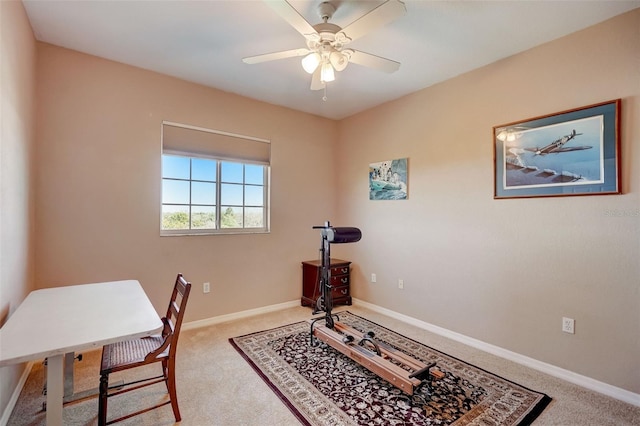 office with ceiling fan and light colored carpet