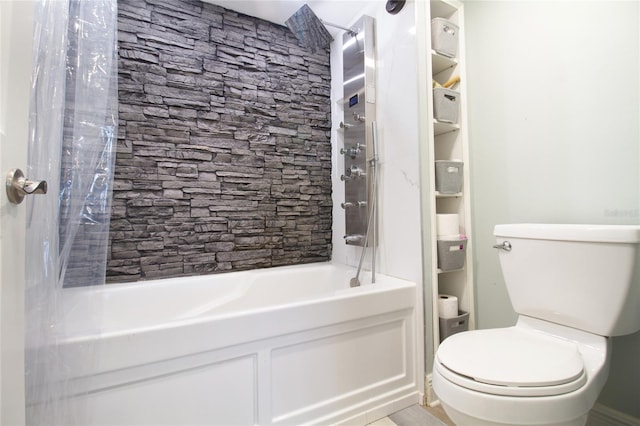 bathroom featuring shower / bath combination with curtain and toilet