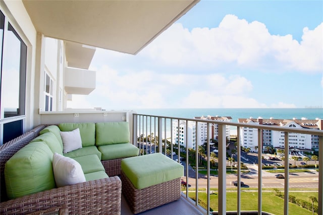 balcony featuring a water view