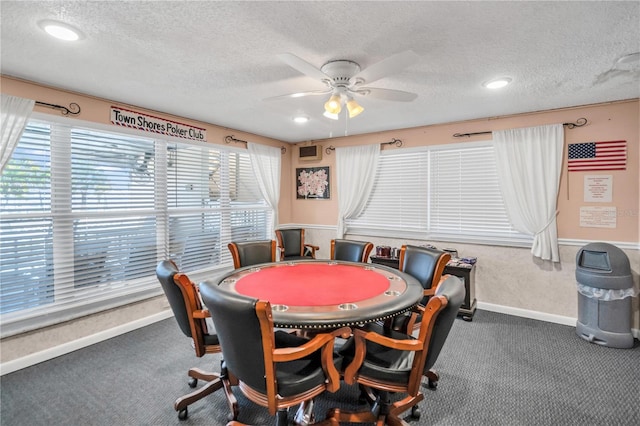 rec room featuring ceiling fan, carpet floors, and a textured ceiling