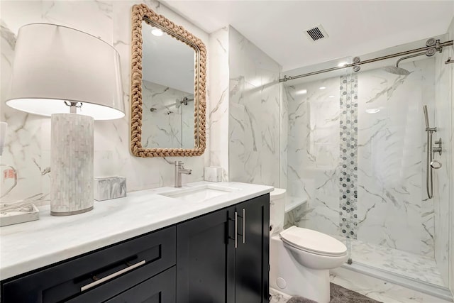 bathroom with toilet, tile flooring, oversized vanity, and tiled shower