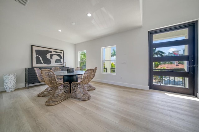 dining area with light wood-type flooring