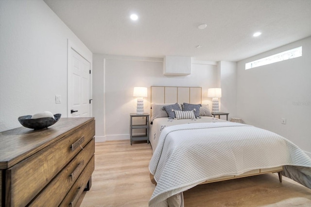 bedroom featuring light wood-type flooring