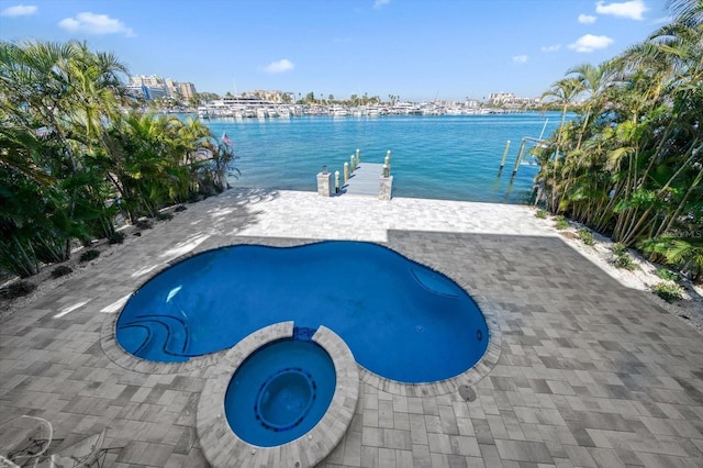 view of pool featuring a water view