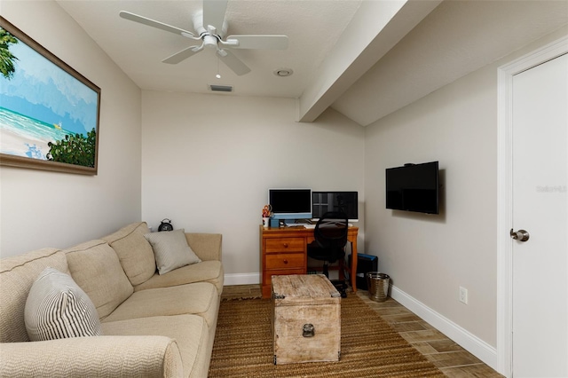 living room featuring beam ceiling and ceiling fan