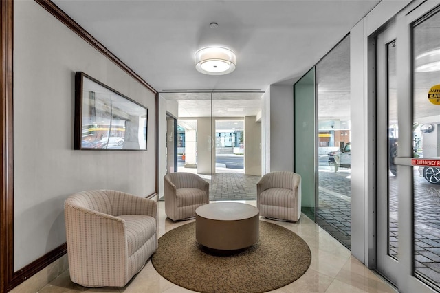 sitting room with light tile floors