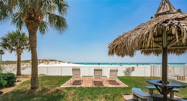 exterior space with a patio and a water view