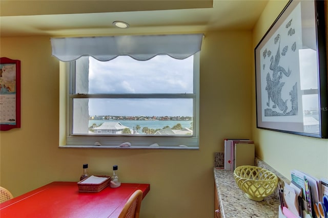 bathroom with a water view