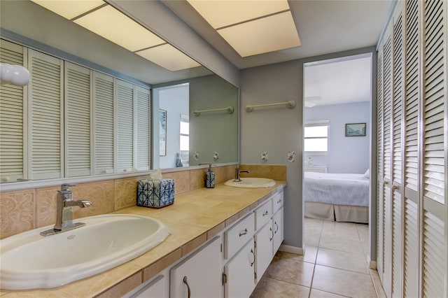 bathroom with vanity and tile patterned floors