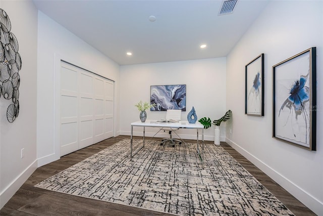 office with dark wood-type flooring