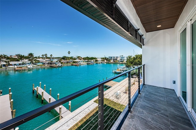 balcony featuring a water view