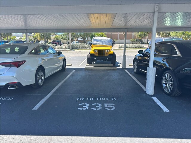 view of parking featuring a carport