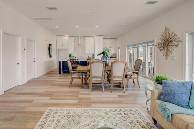 dining area with light wood-type flooring