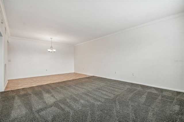 tiled spare room with an inviting chandelier and ornamental molding