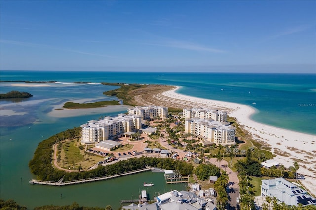 drone / aerial view with a view of the beach and a water view