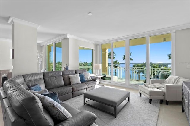 tiled living room featuring crown molding and a water view