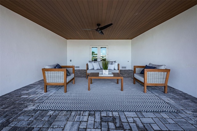 view of patio with ceiling fan and an outdoor hangout area