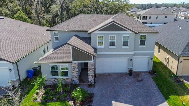 view of front of property with a garage