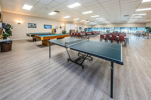 game room featuring visible vents, a drop ceiling, pool table, and wood finished floors