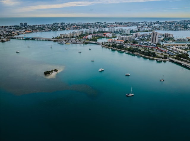 bird's eye view featuring a water view and a view of city