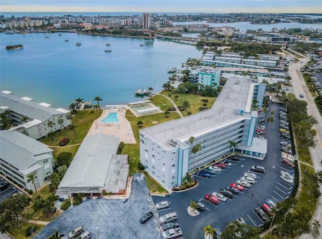 bird's eye view featuring a water view and a city view