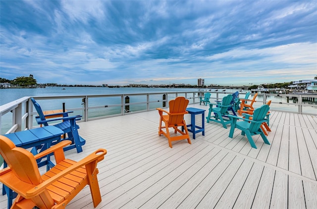 wooden deck with a water view