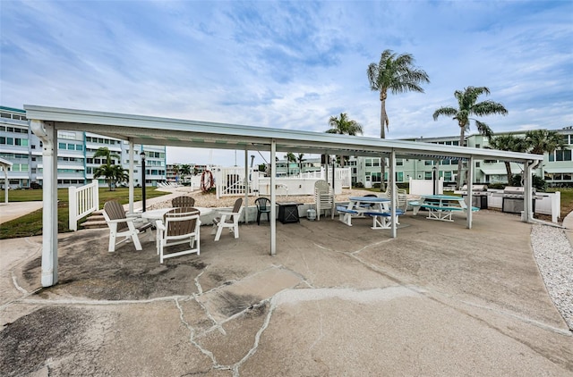 view of patio featuring an outdoor fire pit