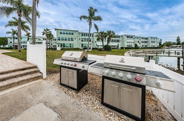 view of patio / terrace featuring a residential view and area for grilling