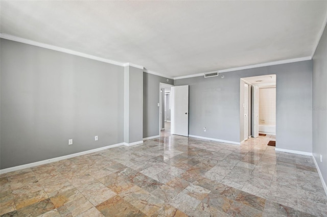 tiled empty room featuring ornamental molding