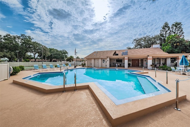 view of pool featuring a patio