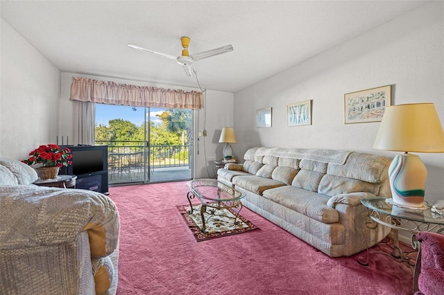 living room featuring carpet and ceiling fan