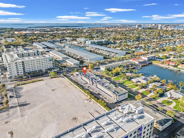 drone / aerial view featuring a water view