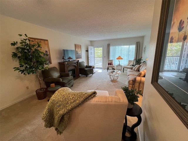 carpeted living room with a textured ceiling