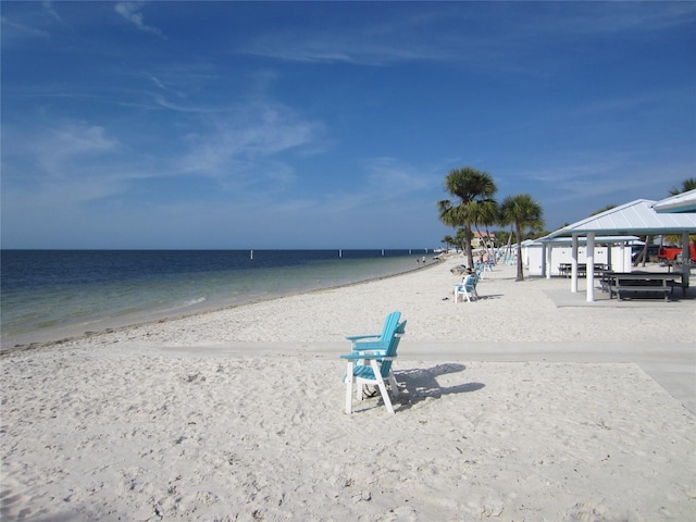 property view of water featuring a beach view and a gazebo