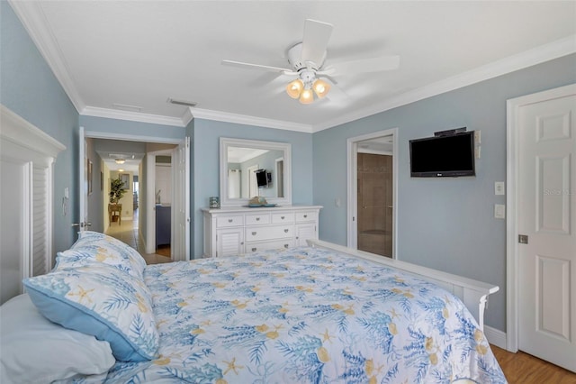 bedroom featuring ceiling fan, crown molding, and light hardwood / wood-style flooring