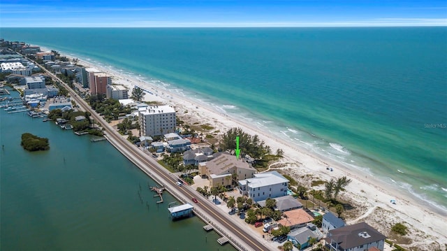 aerial view featuring a water view and a beach view