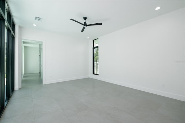 unfurnished room featuring ceiling fan