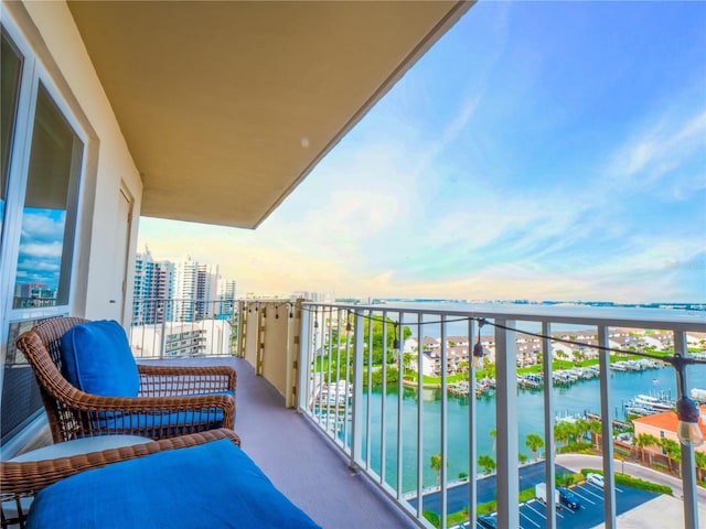 balcony featuring a water view