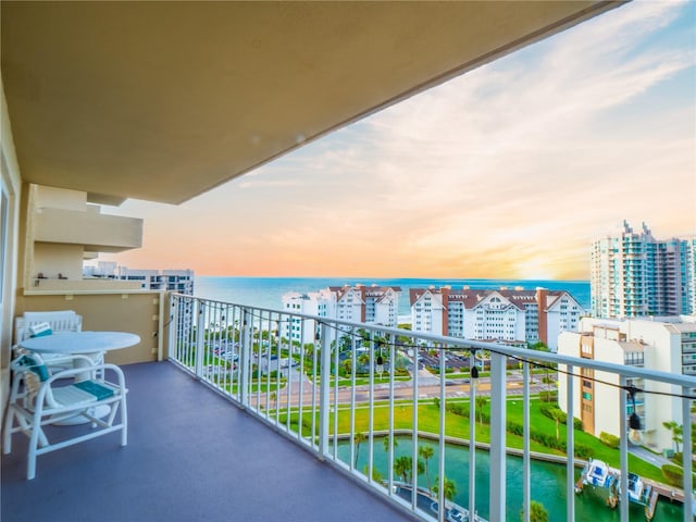 balcony at dusk with a water view