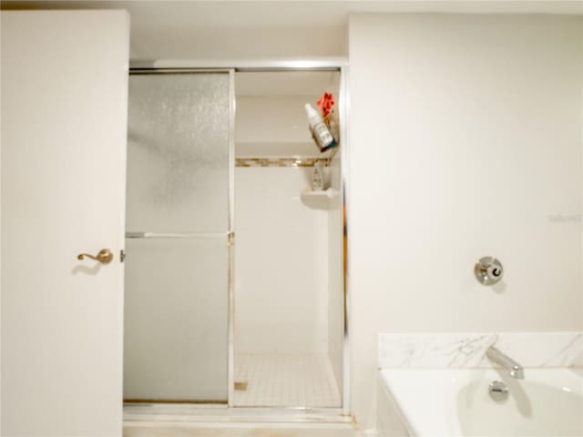 bathroom with independent shower and bath