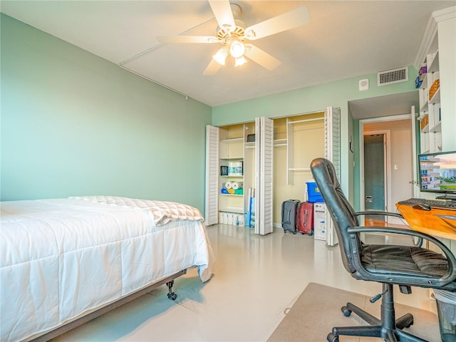 bedroom featuring concrete flooring and ceiling fan