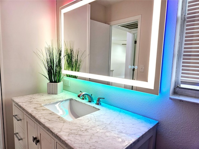 bathroom featuring vanity