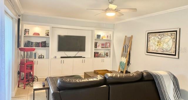 living room with crown molding, ceiling fan, and built in shelves