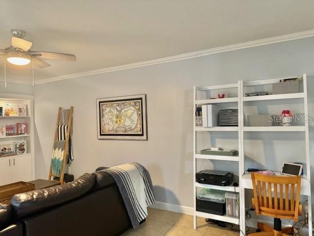 tiled living room with ceiling fan and crown molding