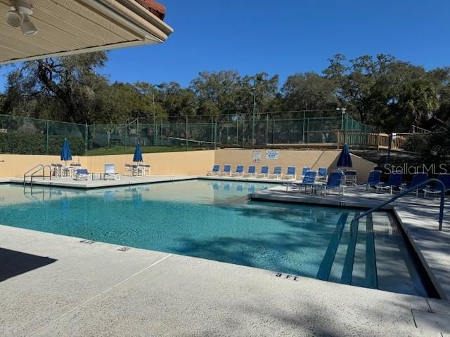 view of swimming pool featuring a patio