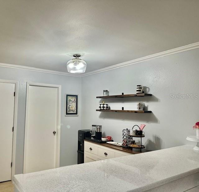 bedroom with crown molding