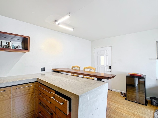 kitchen with light hardwood / wood-style floors