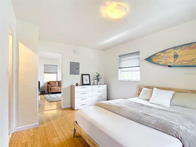 bedroom featuring light wood-type flooring