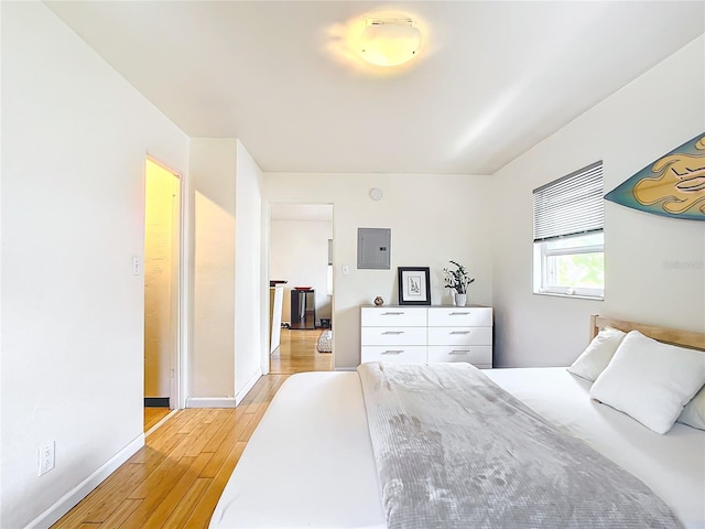 bedroom with light hardwood / wood-style flooring