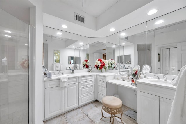 full bathroom featuring a stall shower, recessed lighting, visible vents, and vanity